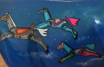 Museum of Cambridge mini-moo, rocking horses on a night sky by artist Marlis Horgan