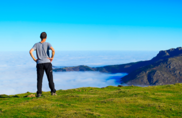 Photo of a man looking out to see - representing a Red Balloon alumni