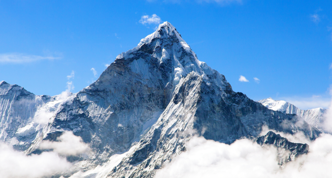 The peak of mount Everest on a sunny day